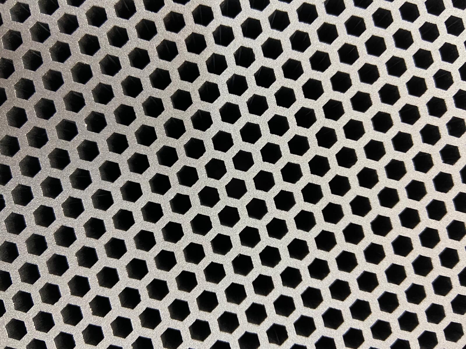 Macro view of hexagonal collimator hole pattern