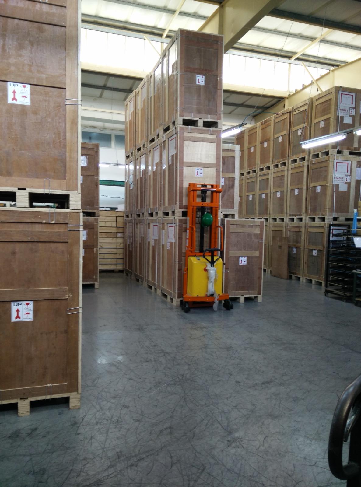 Finished collimator crates staged in the warehouse for shipment